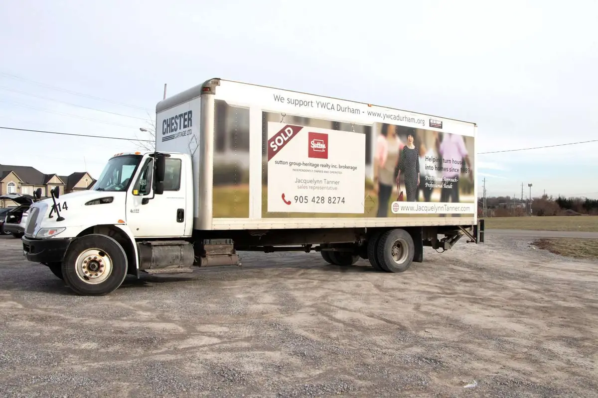 Jacquelynn Tanner Sutton Group Realtor vehicle wrap, photo 1