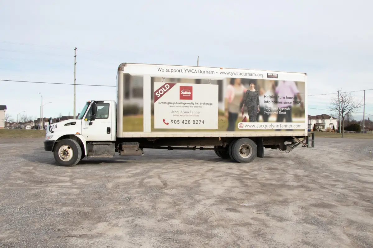Jacquelynn Tanner Sutton Group Realtor vehicle wrap, photo 2