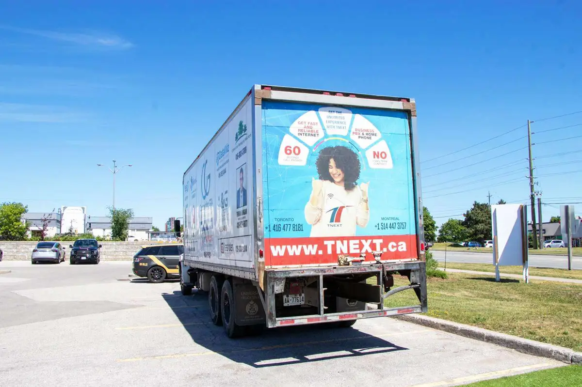 TNext Communications vehicle wrap, photo 1